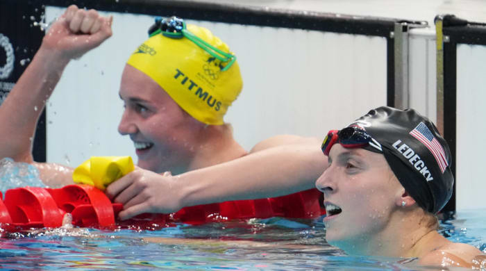 Katie Ledecky (USA) reacts after finishing second to Ariarne Titmus (AUS) in the women's 400m freestyle final during the Tokyo 2020 Olympic Summer Games at Tokyo Aquatics Centre.